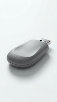 Wireless gray computer mouse with USB receiver on white background, suitable for technology and office equipment design projects.