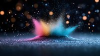 Colorful powder explosion with vibrant pink and blue dust particles floating against dark background. Dynamic motion creates magical atmosphere.