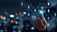 Digital legal technology concept with finger touching virtual justice scale icon on hexagonal interface against blurred city background.
