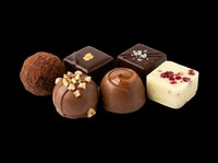 Assorted chocolate bonbons and truffles isolated on transparent background, ready for confectionery design, packaging, print-on-demand products, and culinary graphics.