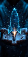 Glowing blue holographic rocket floating above open hands with sparkling particles and light effects against dark background, symbolizing innovation and startup.