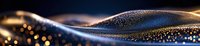 Flowing abstract wave of glowing particles on dark background creates dynamic motion effect with golden and blue light streaks and bokeh elements.