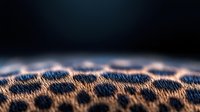 Macro abstract pattern of dark spots with glowing edges creating mysterious organic texture. Blurred background adds depth to natural honeycomb-like structure.