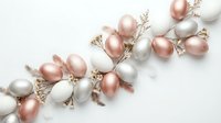 Elegant rose gold and white Easter eggs with delicate branches on soft background for spring holiday celebration and festive decoration design.