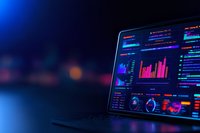 Modern digital tablet displaying financial analytics dashboard with colorful charts, graphs and statistics on dark background with blue lighting effect.