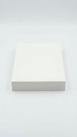 White blank cube block isolated on gray background for product display and geometric design projects.