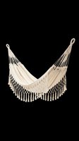 Cream macramé hammock with fringe detailing, isolated on transparent background. Ready for design use on t-shirts, clipart, stickers, print-on-demand products, and sublimation projects.