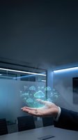 Businessman hand presenting holographic cloud computing icons and data analytics in modern office environment for digital transformation concepts.