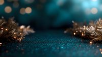 Festive golden tinsel and glitter on dark teal background with bokeh lights creating magical holiday atmosphere. Decorative seasonal backdrop for winter celebrations.