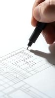 Architect hand drawing technical blueprint sketch with fine liner pen on white paper, close-up view of creative design planning process.