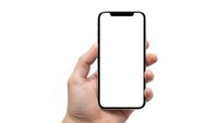 Hand holding modern smartphone with blank white screen isolated on white background for mobile app presentation and digital technology mockup.
