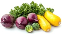 Fresh organic vegetables on white background - red onions, yellow squash, brussels sprouts and curly parsley. Healthy cooking ingredients isolated.