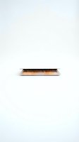 Open gold laptop with black keyboard isolated on white background, side view for web design and technology concepts.