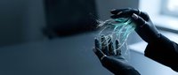 Hands holding glowing digital network lines and data connections, representing technology, innovation, and digital transformation in business and communication.