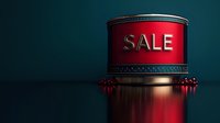 Red cylindrical podium with gold metallic sale text on dark background with dramatic lighting and reflection. Luxury retail marketing concept.
