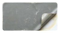 Aged concrete texture with peeling corner revealing weathered layers underneath, showing natural wear and deterioration patterns for industrial design projects.