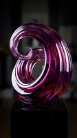 Purple glass sculpture with flowing spiral curves on black pedestal against dark background for modern interior design and contemporary art displays.