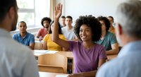 Young African American woman raising hand in university classroom with diverse students during lecture or seminar discussion.