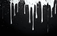 White paint drips flowing down against black background with splatter texture and dramatic contrast, creating abstract minimalist composition for modern design.