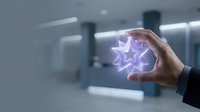 Hand holding glowing five-star rating symbol in modern office environment, representing customer satisfaction, feedback, and quality service excellence.