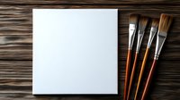Blank white canvas with wooden paint brushes on dark textured wooden background. Art supplies and empty painting surface ready for creative work.