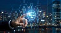 Businessman touching digital justice scale icon surrounded by human figures network against city skyline background representing legal technology solutions.