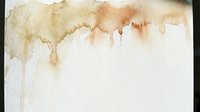 Abstract watercolor background with warm brown and beige tones flowing downward on textured paper, creating organic artistic border for creative projects.