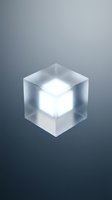 Translucent frosted glass cube with glowing white light core isolated on gradient background, suitable for tech and design projects.