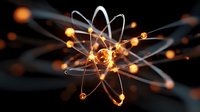 Glowing atomic model with orbiting electrons and nucleus on dark background, orange energy particles and light trails creating scientific visualization.