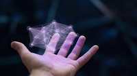 Hand holding glowing network connections with digital nodes and lines representing artificial intelligence, machine learning and futuristic technology concepts.