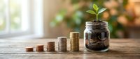 Growing money tree plant in glass jar with stacked coins showing financial growth and investment concept for savings and wealth building strategies.