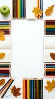 Colorful pencils frame with autumn leaves and green apple on white background. School supplies flat lay composition for creative projects and education.