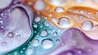 Abstract colorful liquid waves with water droplets creating dynamic fluid motion in purple, orange and teal gradient background for modern design projects.