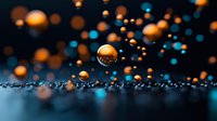 Glowing orange and blue bokeh water drops on dark background create magical atmosphere with floating spheres and reflective surface. Artistic macro photography.