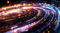 Glowing spiral light trails with blue and orange streaks create dynamic motion effect against dark background, abstract technology concept for digital design.