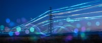 Electric power transmission tower with glowing energy lines and bokeh lights against twilight sky for technology and infrastructure concepts.