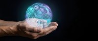 Male hands holding glowing holographic sphere with swirling patterns against dark background for technology and innovation concepts.