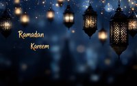 Traditional Arabic lanterns glowing against dark blue night sky with golden Ramadan Kareem text and bokeh lights creating magical festive atmosphere.