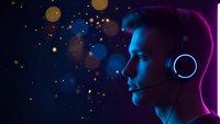 Young man with headphones listening to music against cosmic starry night sky background with glowing bokeh lights and neon purple blue lighting effects.