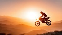Motocross rider jumping dirt bike against golden sunset mountain landscape silhouette. Extreme sports adventure and freedom concept for outdoor recreation designs.
