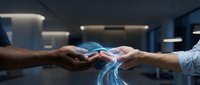 Business professionals exchanging smartphone with glowing digital data transfer effect in modern office environment for technology and communication concepts.