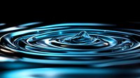 Water drop falling into dark liquid creating concentric ripples with blue highlights against black background, macro photography showing surface tension dynamics.