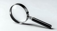 Classic magnifying glass with black handle and silver metal rim isolated on white background for detective, investigation, and search concepts.