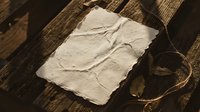 Vintage aged paper with torn edges and rope on rustic wooden planks background for antique design projects and historical themed presentations.