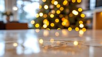 Dreamy golden bokeh lights create magical atmosphere on reflective surface with soft blur and warm glow, festive holiday mood for seasonal backgrounds.