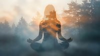 Woman meditating in lotus position surrounded by misty forest at sunrise, with golden light creating double exposure effect, promoting wellness and mindfulness practices.