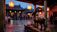 Traditional Chinese temple courtyard with ornate bronze lion statue and glowing red lanterns at dusk, tourists exploring historic architecture and cultural heritage site.