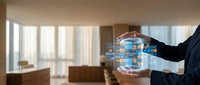 Businessman holding digital hologram of smart home technology in modern office interior with city view.