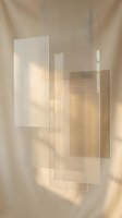 Transparent acrylic sheets and frosted glass panels arranged in overlapping composition with warm sunlight casting soft shadows on neutral beige background. Isolated design elements.