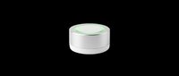 Round smart home device with glowing green LED ring, isolated on transparent background, ready for T-shirt design, stickers, clipart, and print on demand use.